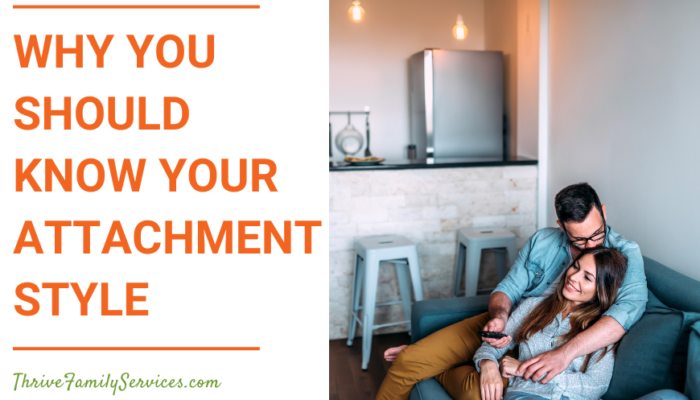 Orange text on a white background that reads "Why You Should Know Your Attachment Style" to the left of a photo of a couple embracing on a couch. We can see they're in a living room with a kitchen behind them. The man is kissing the woman on the head and they look content. | Denver Colorado Couples Therapist