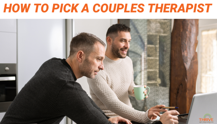Dark orange text on a white background that reads "How to Pick a Couples Therapist" over a stock photo of a gay male couple standing at a counter with coffee mugs in their hands, pointing and looking at a laptop.