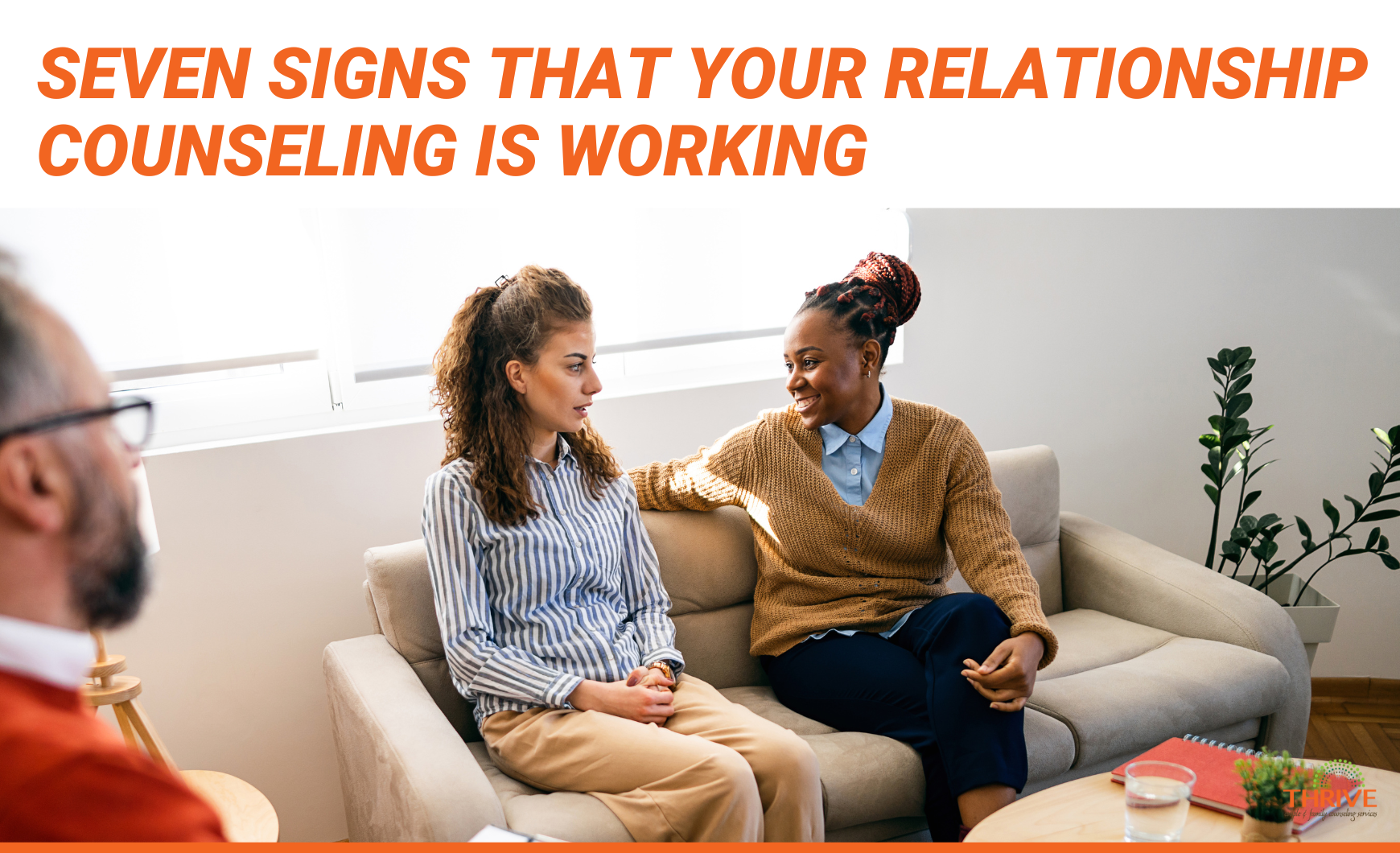 Dark orange text that reads "Seven Signs That Your Relationship Counseling is Working" above a stock photo of an interracial lesbian couple sitting on a couch in a counseling office, with their counselor, a man, in the bottom left corner.