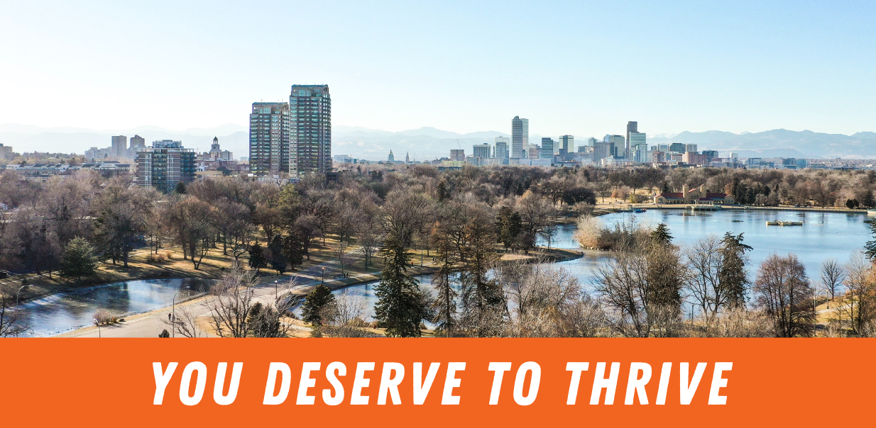 Graphic that is 3/4 photo, and the bottom 1/4 is an orange background with white text that says "You Deserve To Thrive" The photo is of the Denver skyline. | Englewood, CO counseling