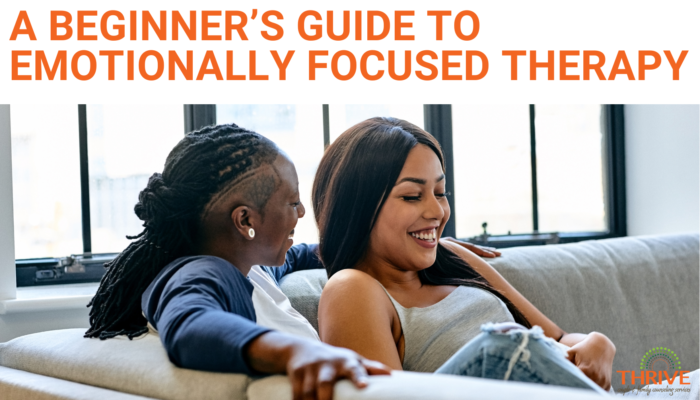 A graphic that reads "A Beginner's Guide to Emotionally Focused Therapy" above a stock photo of a Black lesbian couple sitting on a gray couch and smiling. Emotionally Focused Couples Therapy in Colorado