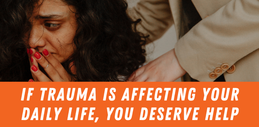 Graphic that reads "If trauma is affecting your daily life, you deserve help." Below a stock photo of a woman in distress with her hands on her face being comforted by someone standing (we can't see their face). The standing person has their hands on the woman's shoulders. | Trauma and EMDR counseling Denver Colorado